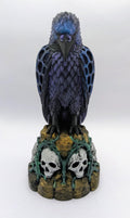 Necro Raven No. 2, hand-painted skull perch sculpture, front view