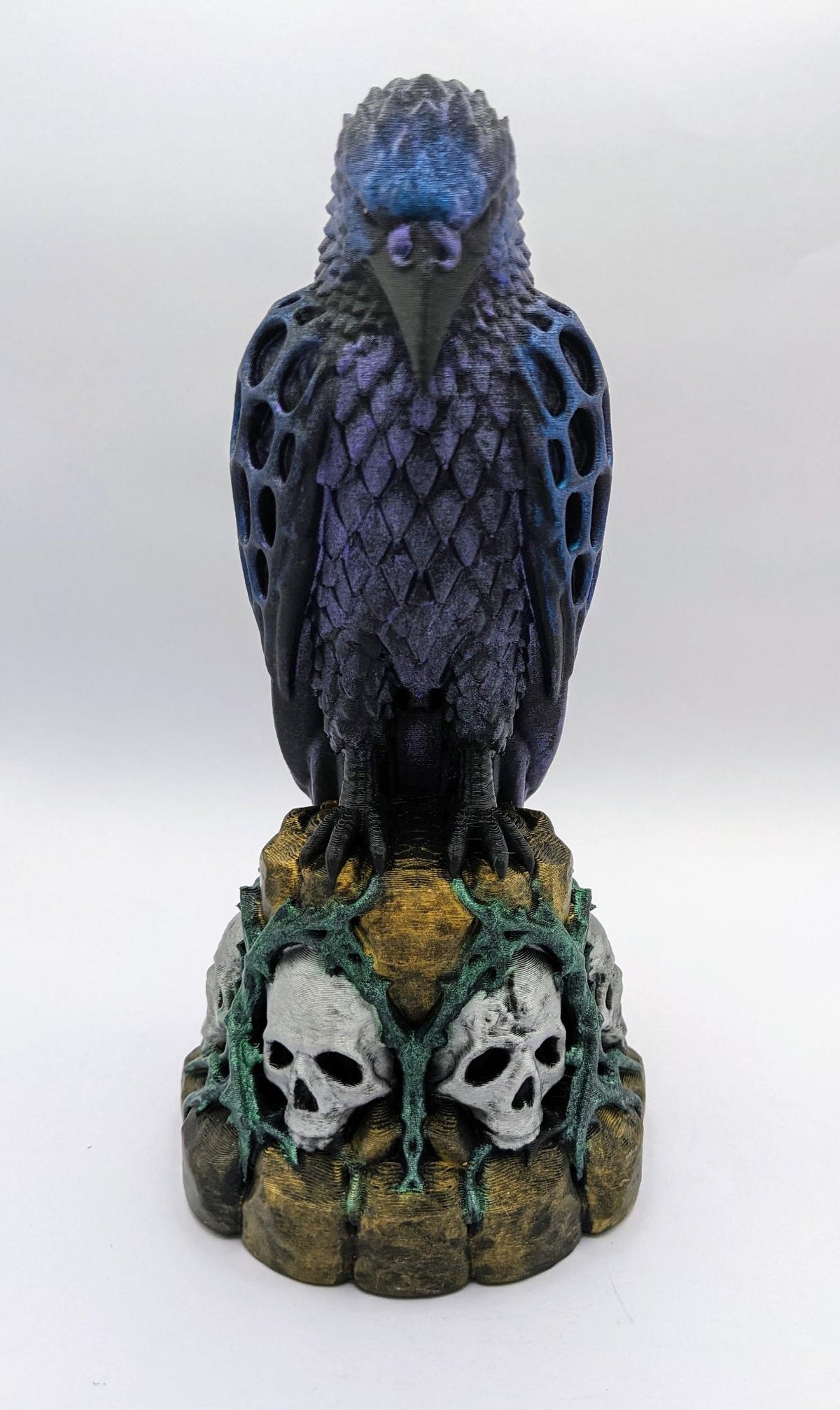 Necro Raven No. 2, hand-painted skull perch sculpture, front view