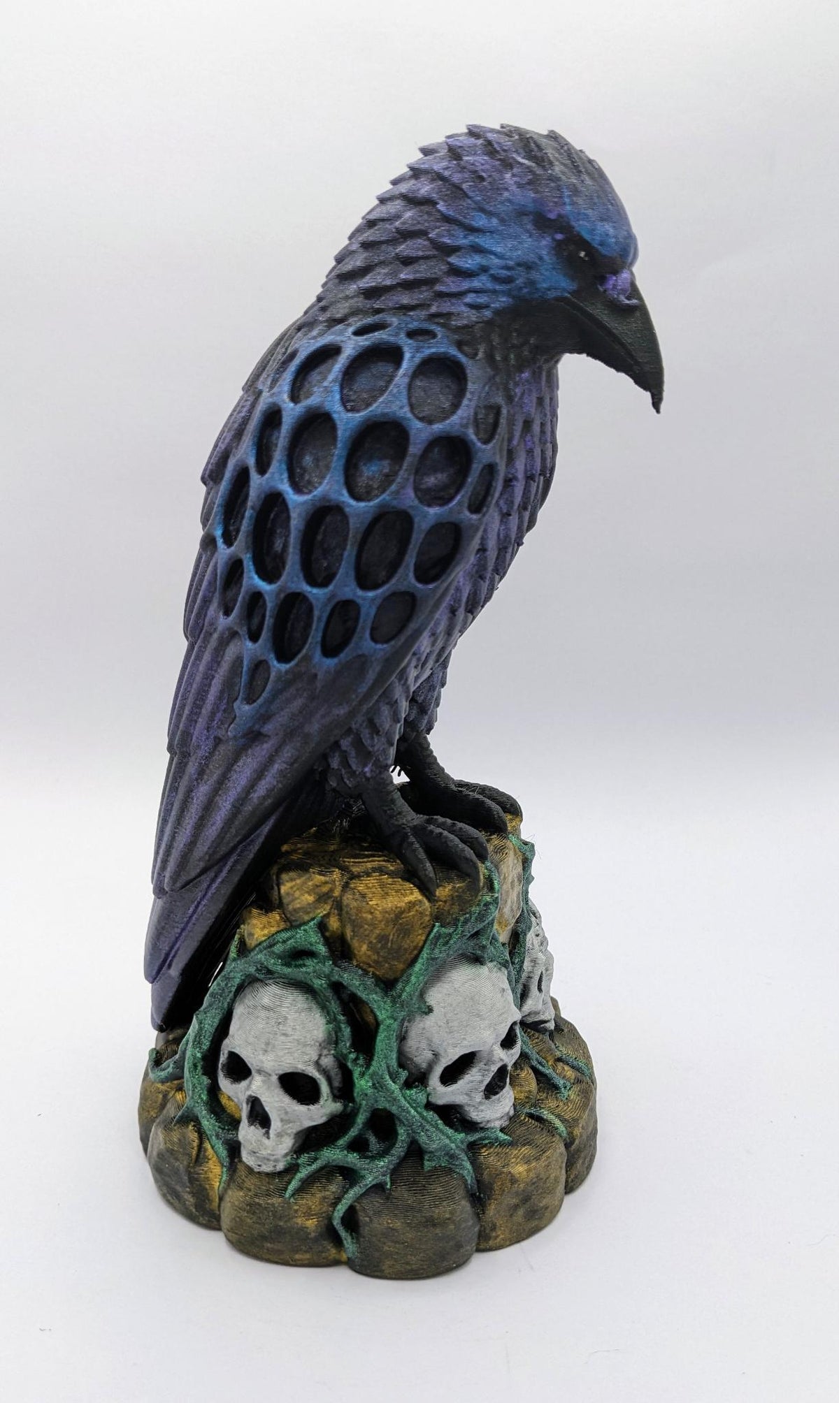 Necro Raven No. 2, hand-painted skull perch sculpture, right side view