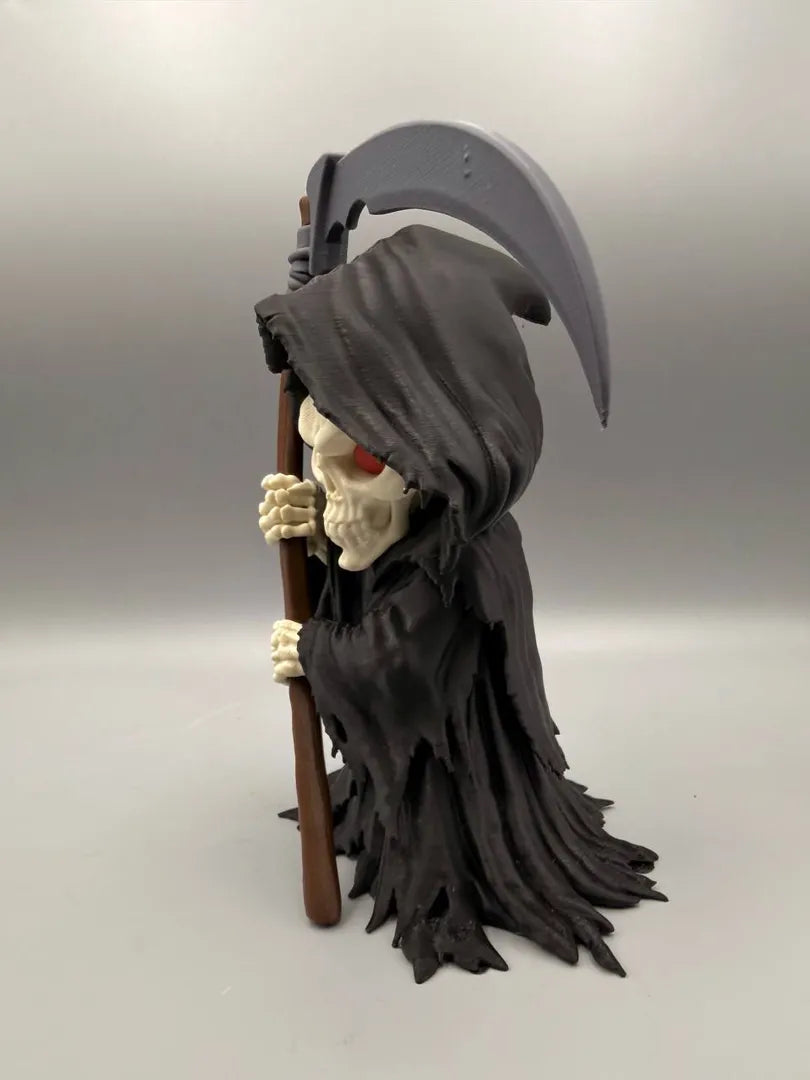 Grim Reaper sculpture, side view