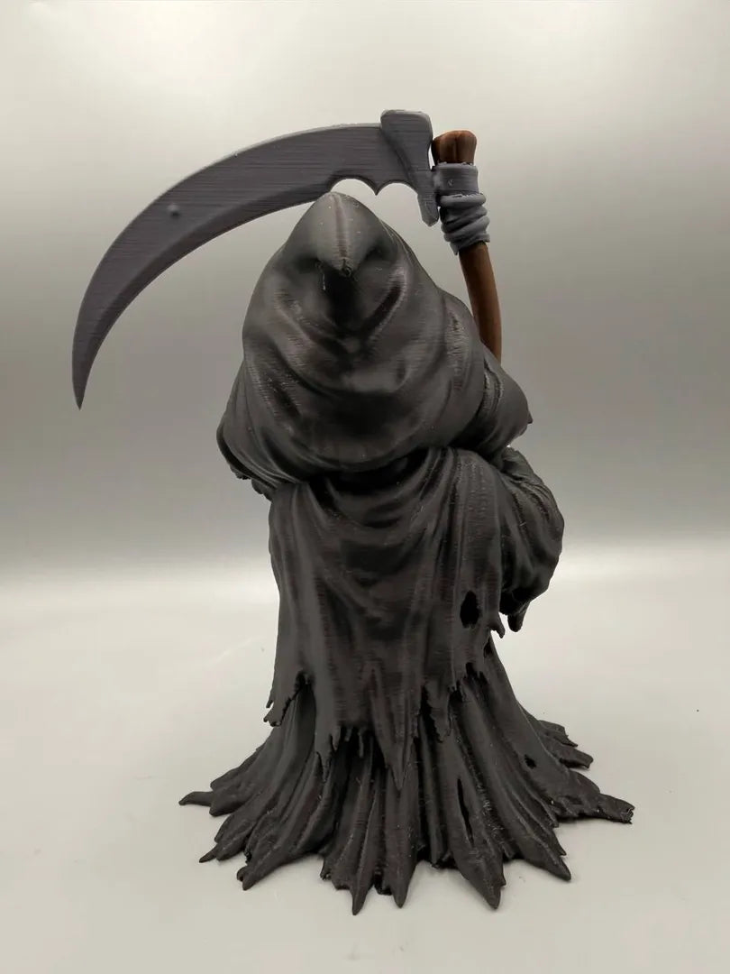 Grim Reaper sculpture, back view