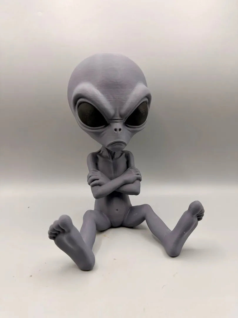 Grumpy Alien sculpture, side view