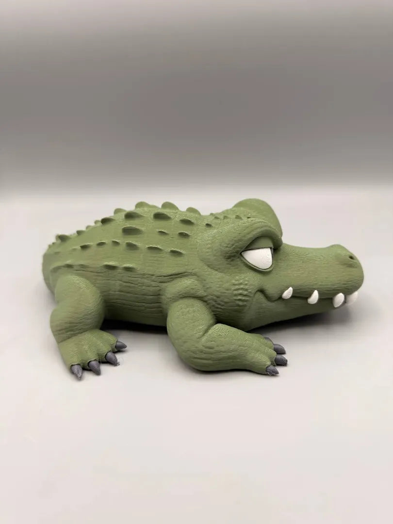 Grumpy Alligator sculpture, angled view