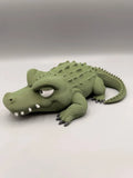 Grumpy Alligator 3D printed sculpture, three-quarter view