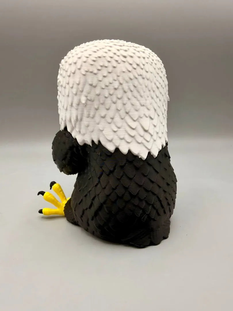 Grumpy Bald Eagle sculpture, back view