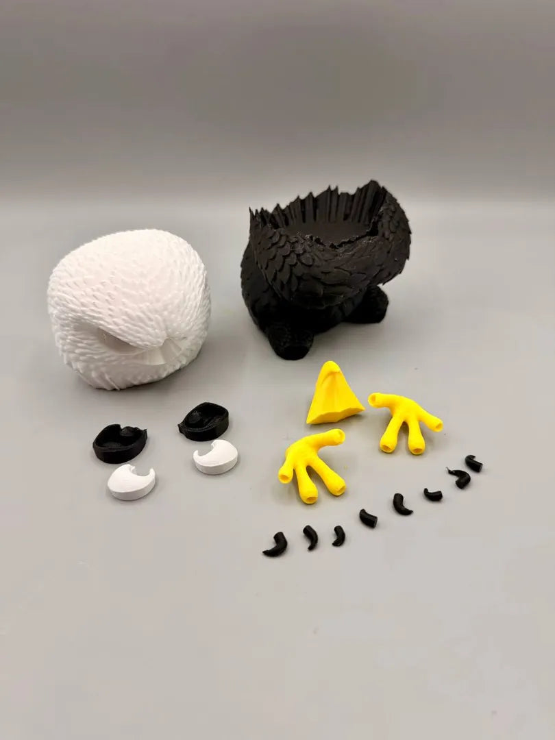 Grumpy Bald Eagle shown with its separately printed parts before assembly