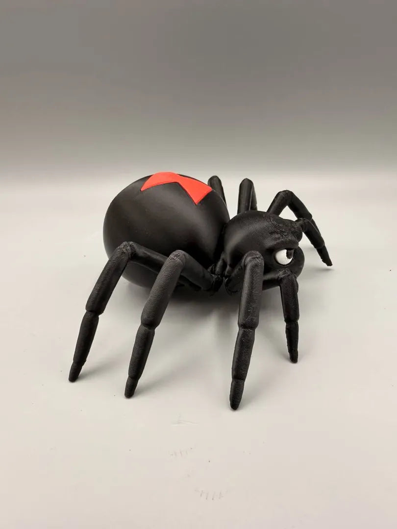 Grumpy Black Widow sculpture, three-quarter view
