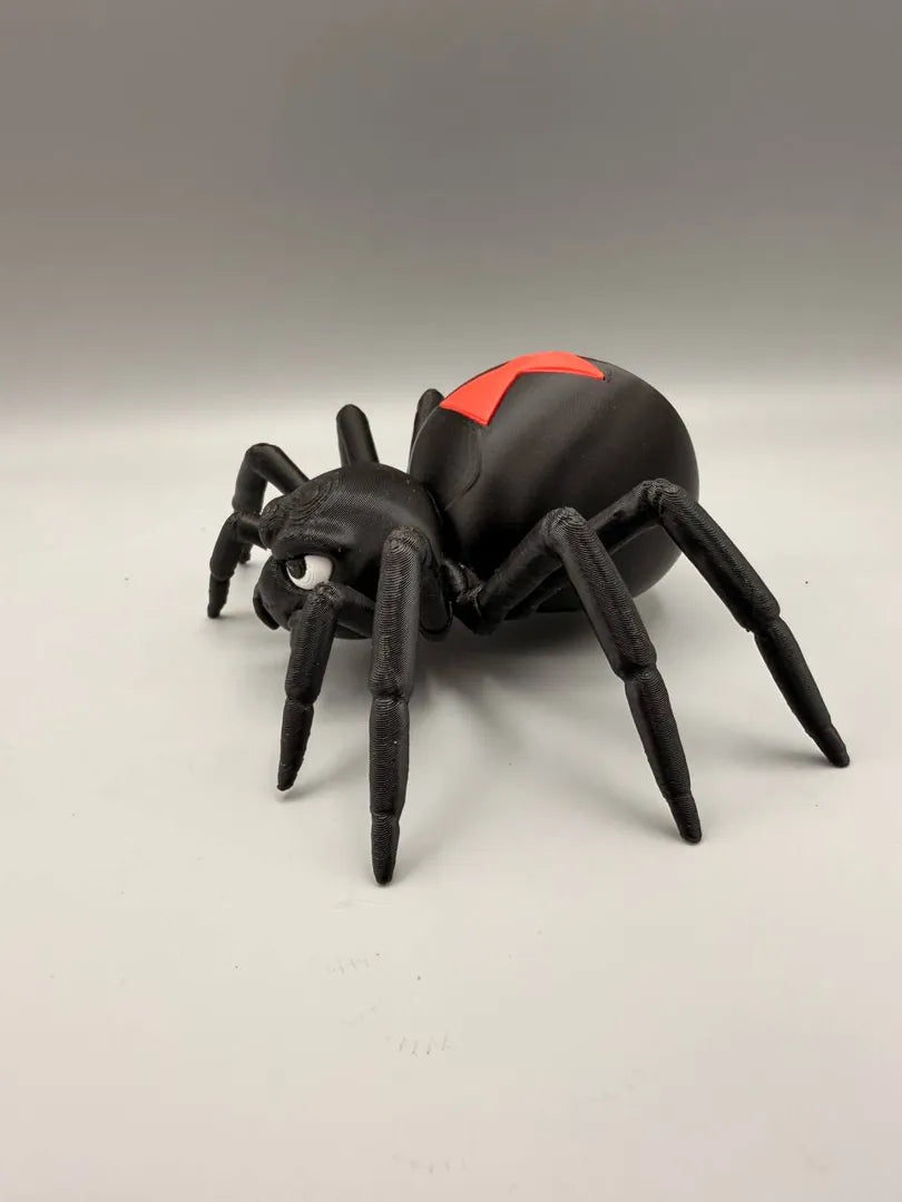 Grumpy Black Widow sculpture, head-on view