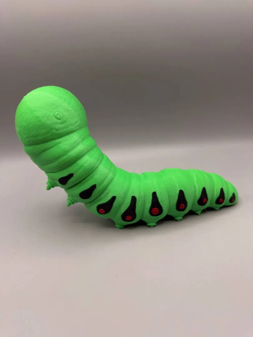 Grumpy Caterpillar sculpture, three-quarter view