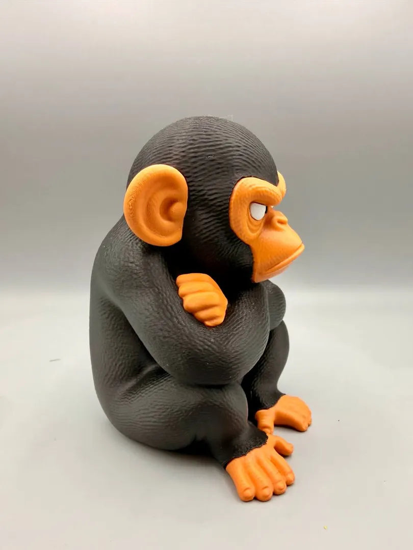 Grumpy Chimpanzee sculpture, three-quarter view