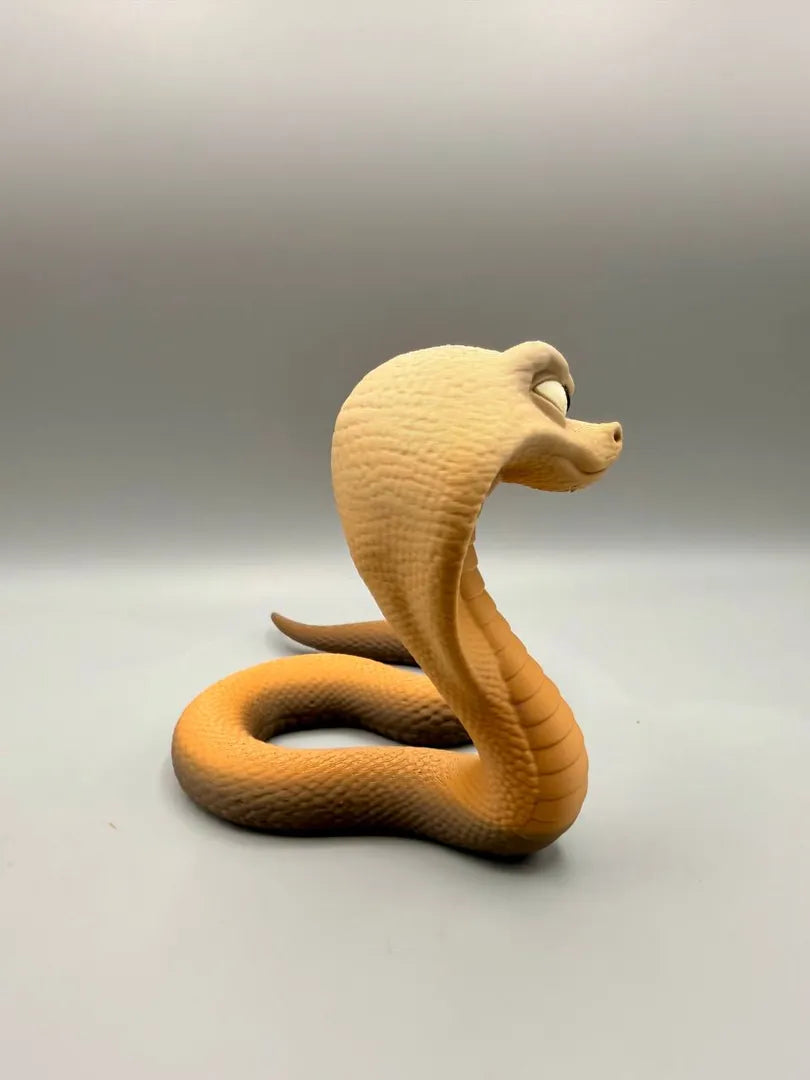 Grumpy Cobra sculpture, side view