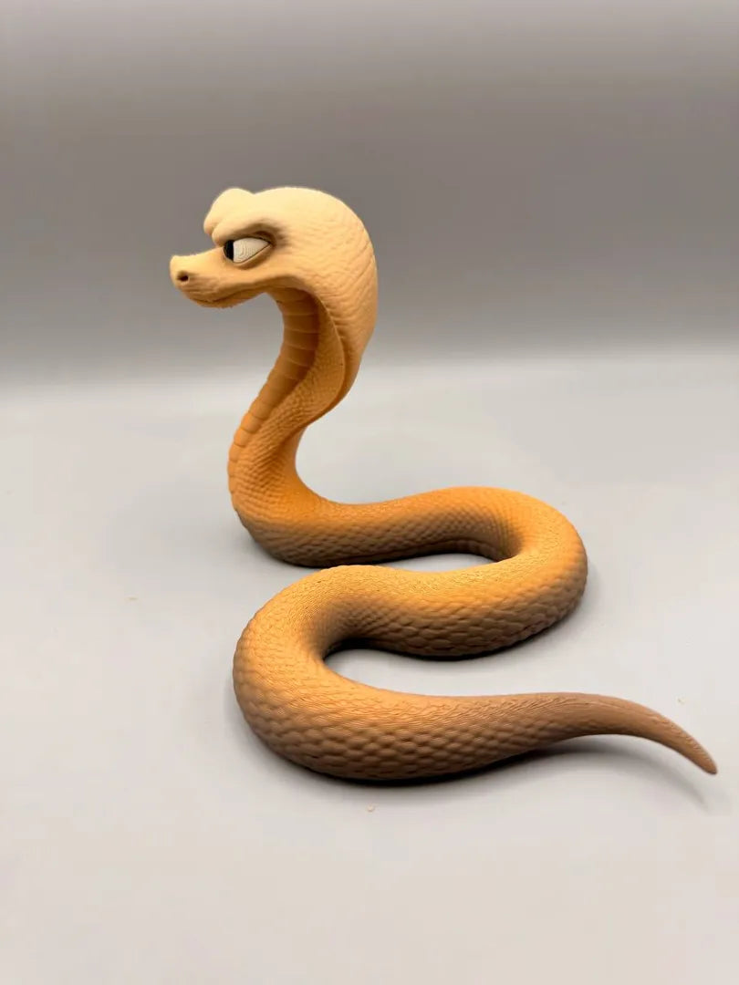 Grumpy Cobra sculpture, three-quarter view
