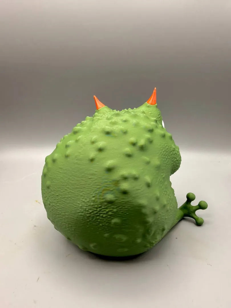 Grumpy Frog sculpture, back view