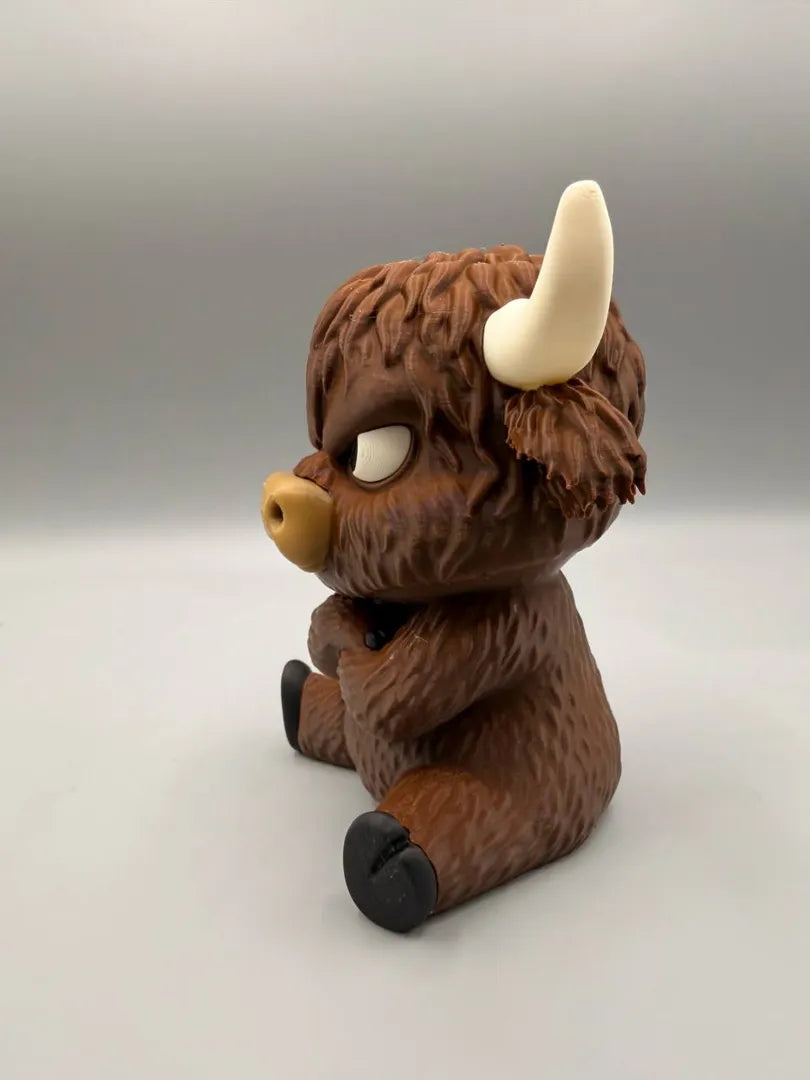 Grumpy Highland Cow sculpture, front view