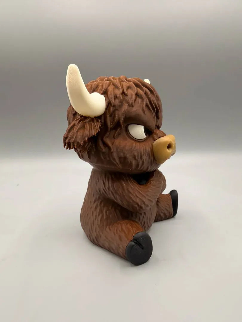 Grumpy Highland Cow sculpture, three-quarter view