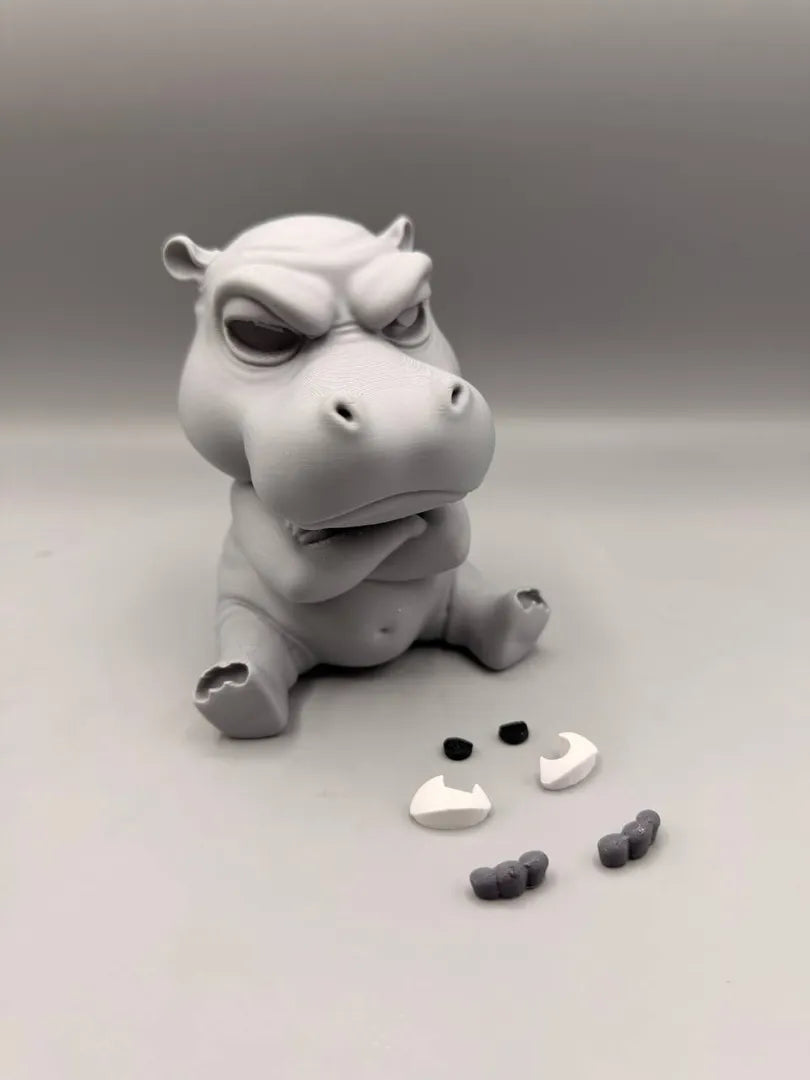 Grumpy Hippo shown with its separately printed parts before assembly