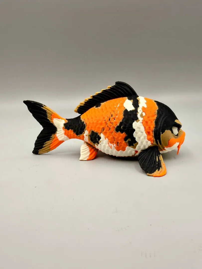 Grumpy Koi sculpture, three-quarter view