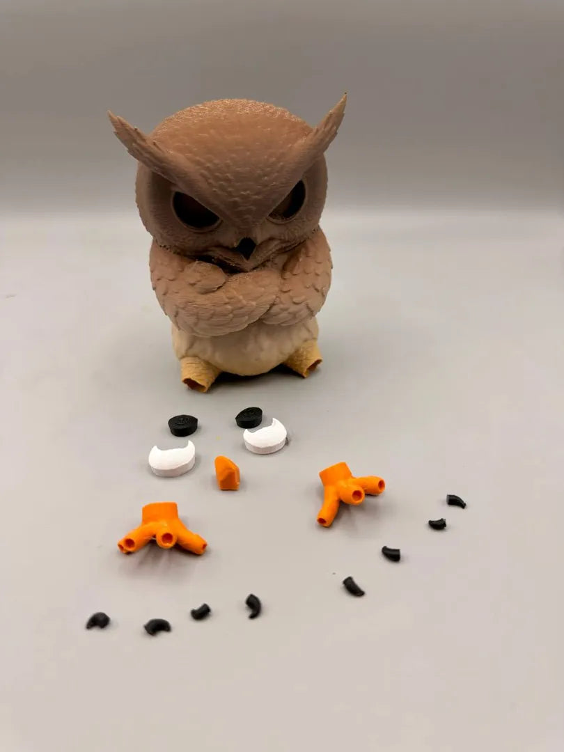 Grumpy Owl shown with its separately printed parts before assembly