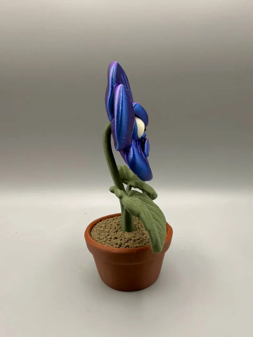 Grumpy Pansy sculpture, side view
