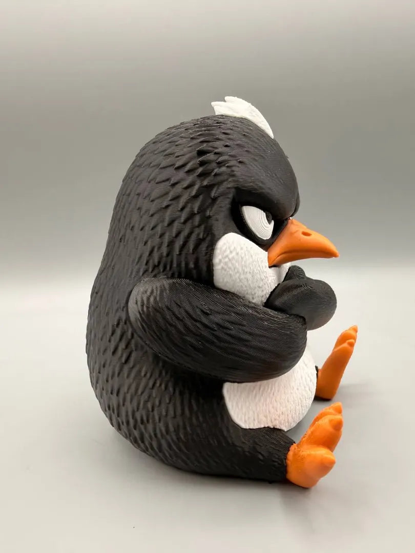Grumpy Penguin sculpture, side view
