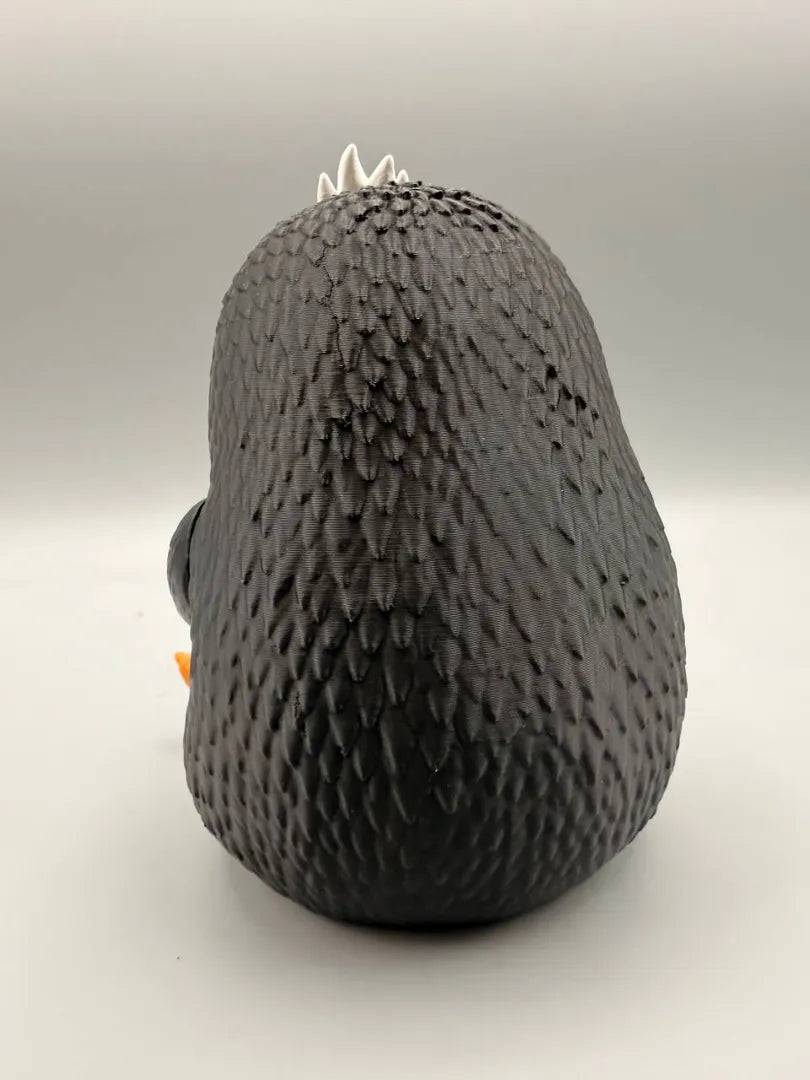 Grumpy Penguin sculpture, back view