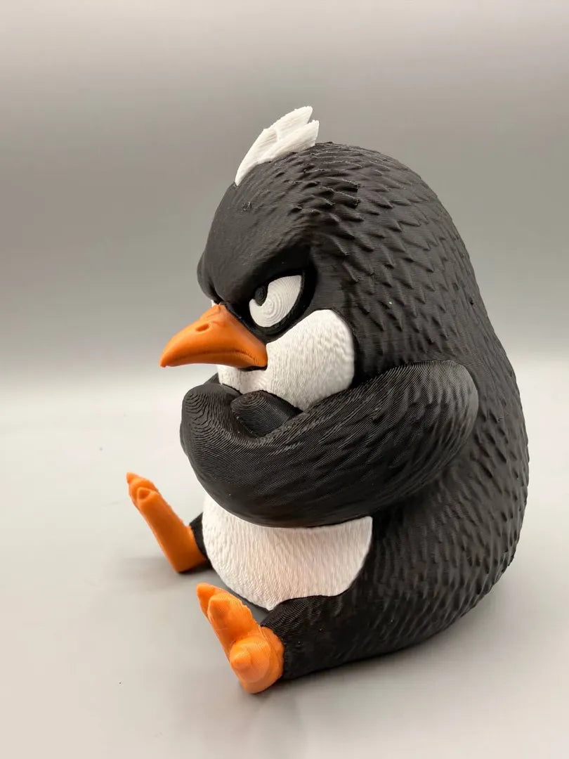 Grumpy Penguin sculpture, three-quarter view