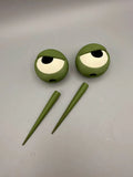 Grumpy Plant Eyes, a pair of 3D printed plant stakes, front view
