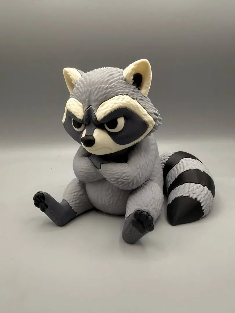 Grumpy Raccoon sculpture, front view
