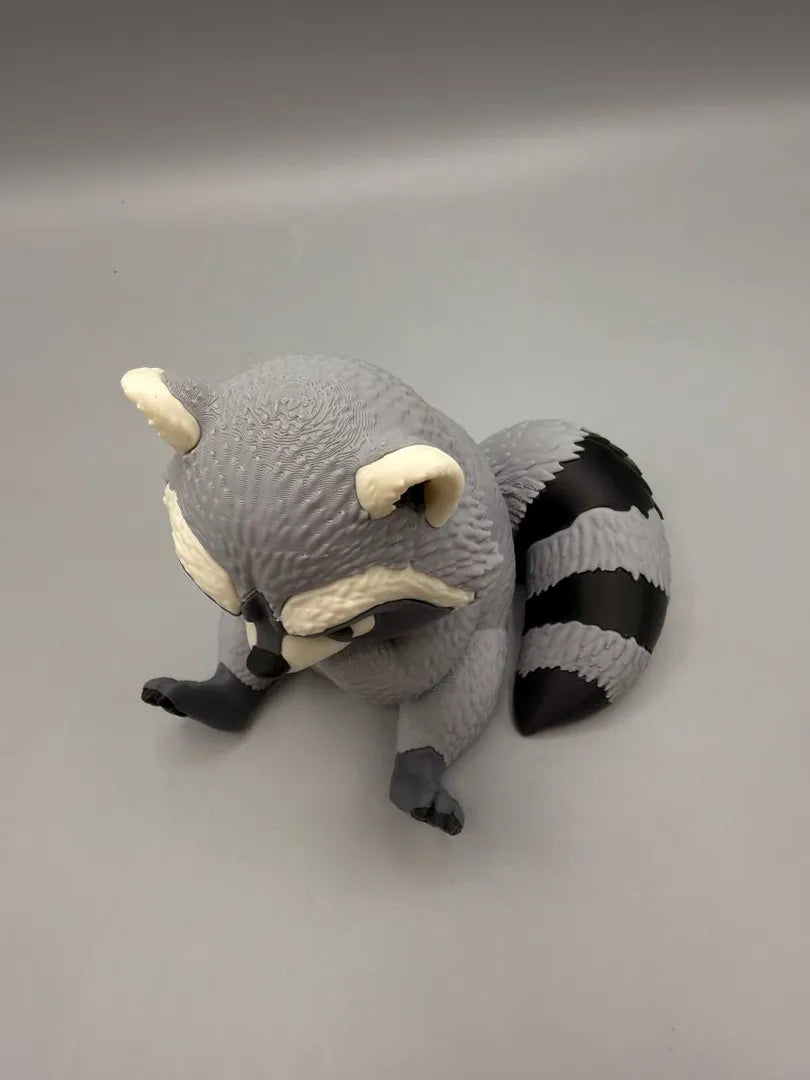 Grumpy Raccoon sculpture, rear three-quarter view