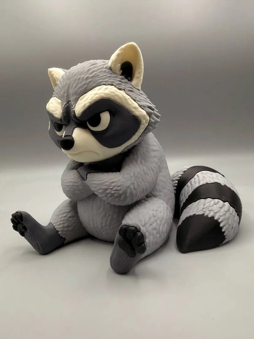 Grumpy Raccoon sculpture, three-quarter view
