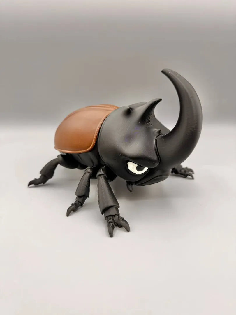 Grumpy Rhino Beetle sculpture, head-on view