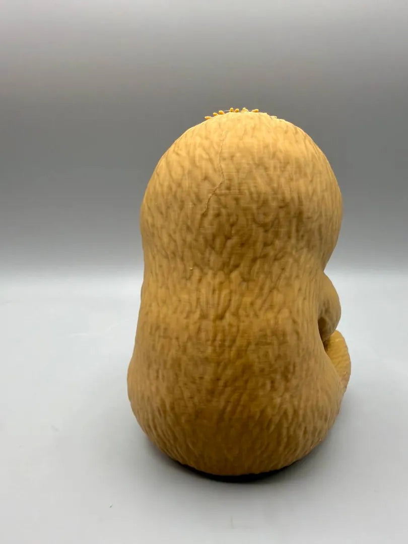 Grumpy Sloth sculpture, back view