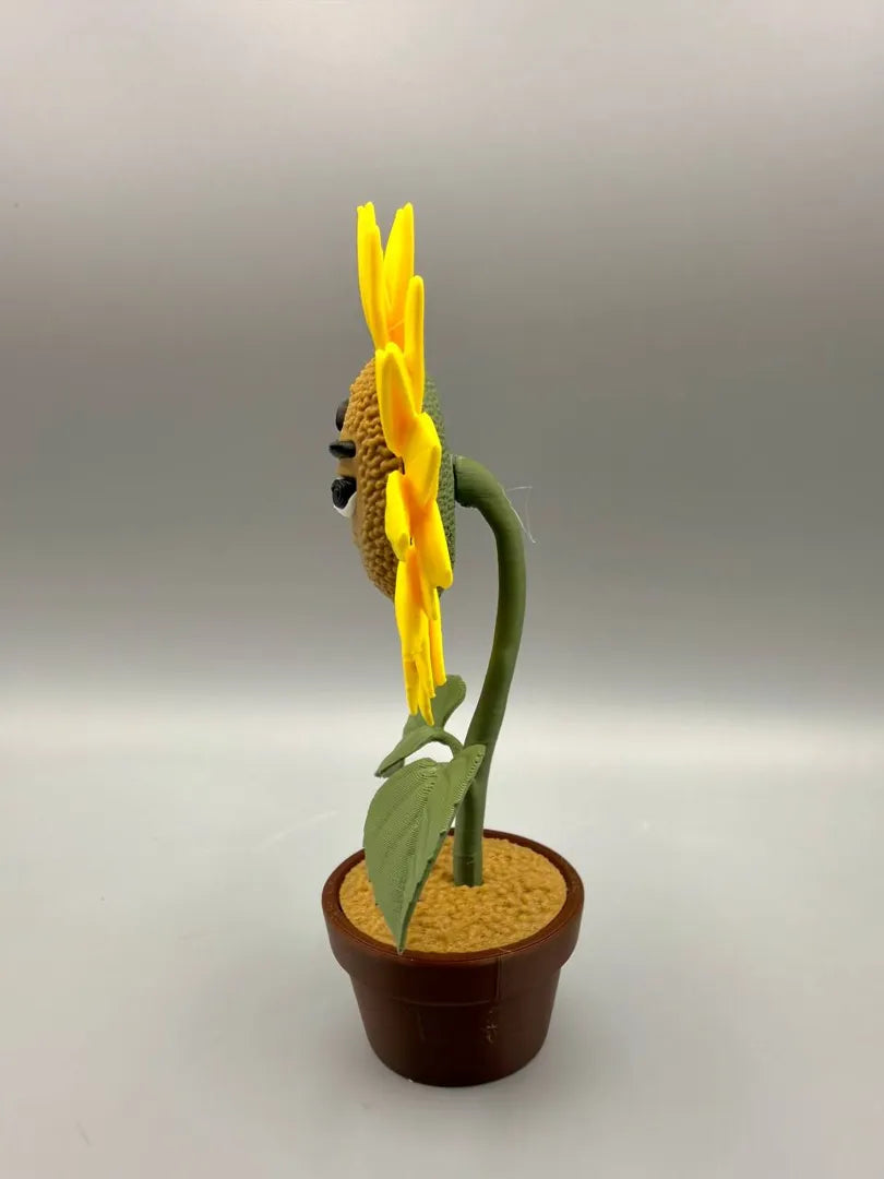 Grumpy Sunflower sculpture, side view