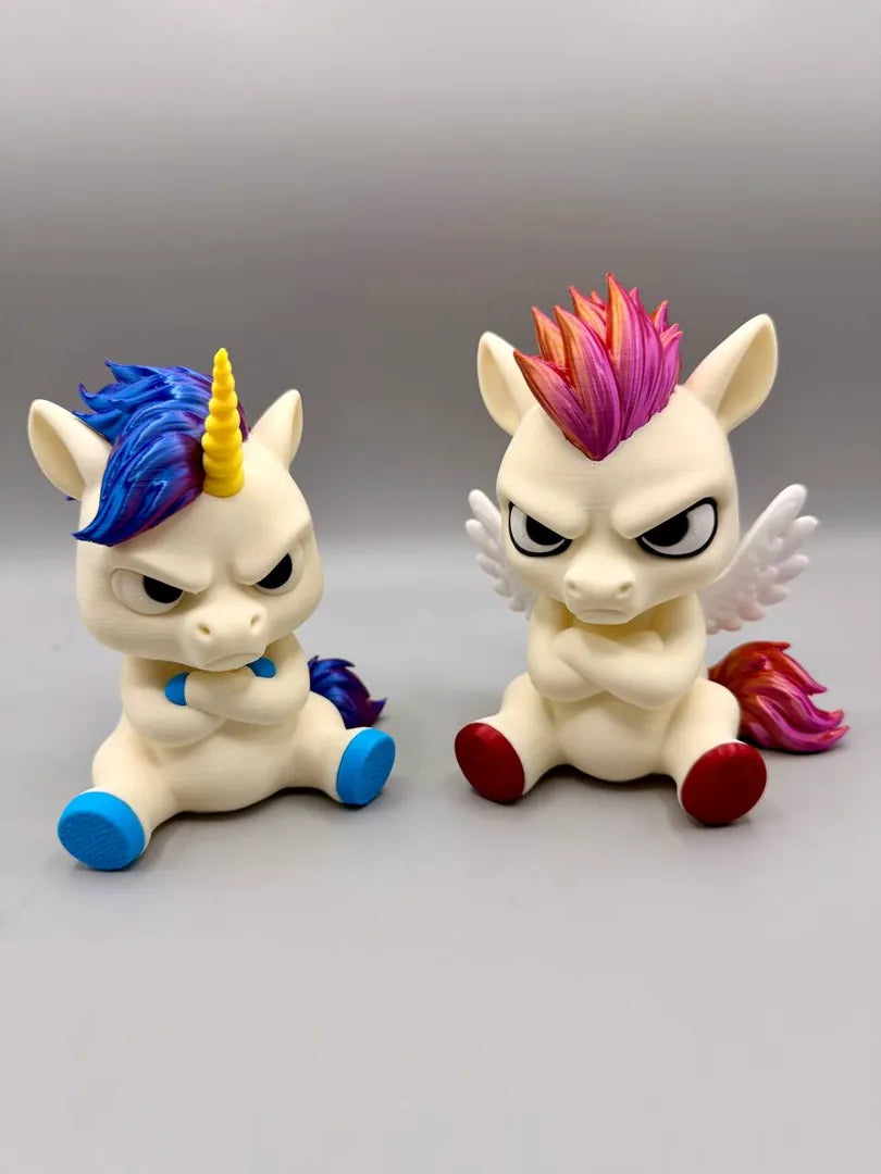 Grumpy Unicorn shown alongside a companion print