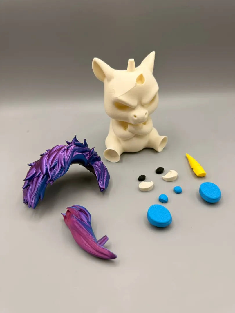 Grumpy Unicorn shown with its separately printed parts before assembly