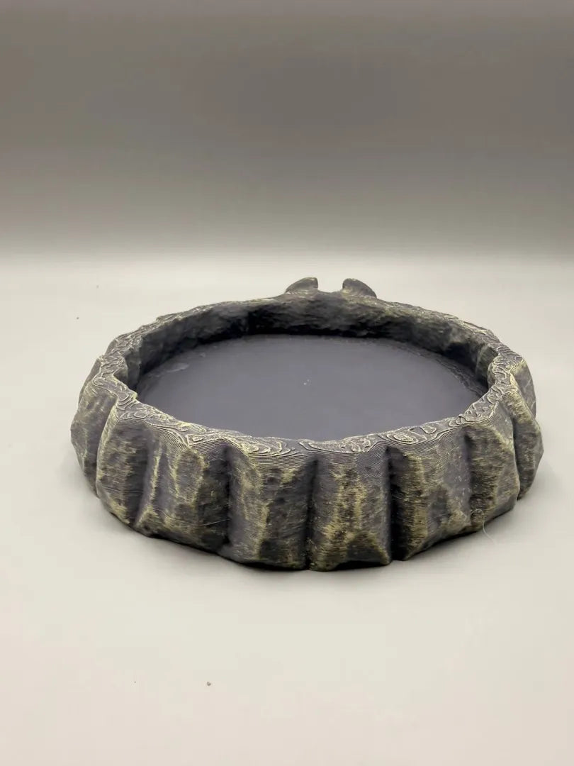 Happy Stone Bird Bowl, three-quarter view