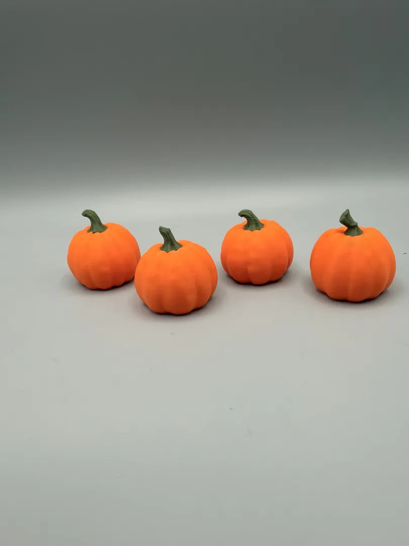 Little Pumpkins set of four, showing each face