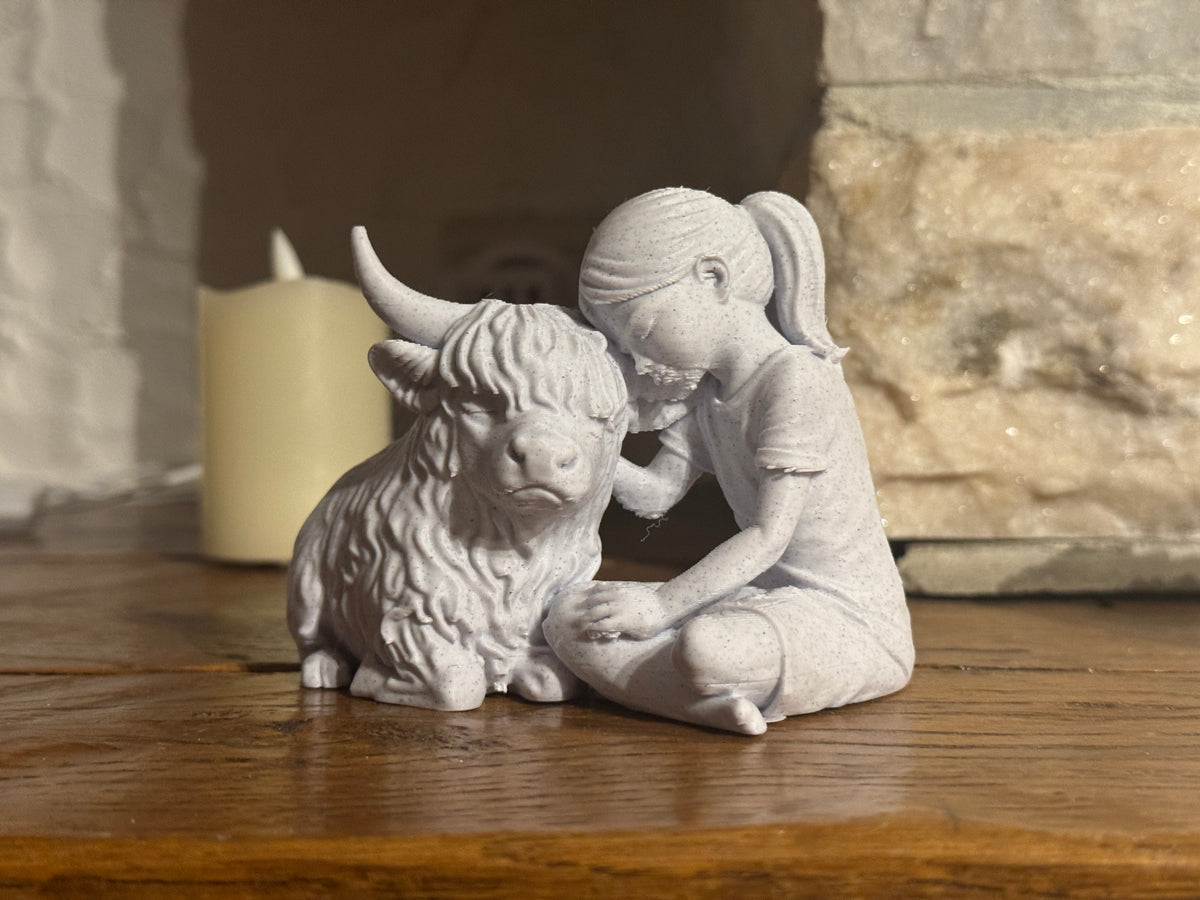 Gentle Bond Girl and Highland Cow sculpture